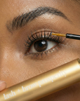 Rejuvenate and strengthen lashes and brows with Nubyén Lash + Brow Prosperity Growth Enhancer. This 100% natural serum combines Baobab, Olive Squalene, Tamanu, and Candlenut oils to repair and nourish hair follicles. Infused with rosemary and raspberry seed extracts, it rebuilds keratin bonds for fuller, thicker brows and lashes. Lightweight, fast-absorbing, and free from harsh chemicals, it's the perfect solution for safe and natural lash and brow enhancement. Pair with Restore Me Brow Pomade for ultimate