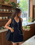 Marylebone Low Back Flare Dress featuring a stunning low-back design and a flattering flared silhouette. Crafted with high-quality, lightweight fabric, this dress combines sophistication and comfort, perfect for formal events or evening occasions. Its timeless design highlights effortless style and grace