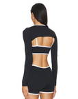 sleek double-layer design for enhanced support and a flattering silhouette. Perfect for yoga, Pilates, or casual wear, the lightweight and breathable fabric ensures optimal performance and comfort. Ethically crafted with premium materials, it embodies Nubyen’s core values of excellence, honesty, and integrity. Transition effortlessly from workout to street style with this top