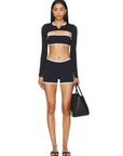 sleek double-layer design for enhanced support and a flattering silhouette. Perfect for yoga, Pilates, or casual wear, the lightweight and breathable fabric ensures optimal performance and comfort. Ethically crafted with premium materials, it embodies Nubyen’s core values of excellence, honesty, and integrity. Transition effortlessly from workout to street style with this top