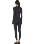 Bold Nubyén Non-conformist Bodysuit featuring a sleek, form-fitting design with unique detailing that exudes confidence and individuality. Made from high-quality, stretchable fabric for comfort and versatility, this statement piece is perfect for layering or wearing alone, embodying a modern, edgy aesthetic
