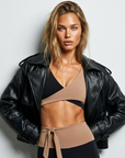 Nubyen The Minimalist Boxy Vegan Leather Jacket combines timeless design with sustainable fashion. Crafted from premium vegan leather, this chic boxy jacket features a relaxed fit, structured shoulders, and modern detailing. Perfect for layering, it pairs effortlessly with any outfit, offering a cruelty-free, eco-conscious alternative to traditional leather. Ideal for day-to-night style
