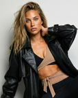 Nubyen The Minimalist Boxy Vegan Leather Jacket combines timeless design with sustainable fashion. Crafted from premium vegan leather, this chic boxy jacket features a relaxed fit, structured shoulders, and modern detailing. Perfect for layering, it pairs effortlessly with any outfit, offering a cruelty-free, eco-conscious alternative to traditional leather. Ideal for day-to-night style