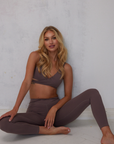 Nubyén Lleida High Rise Surplice Front V Wrap Legging is perfect for a flattering fit and elevated style. Designed with a high-rise waistband and surplice V front wrap, these leggings offer comfort and flexibility for both activewear and casual wear