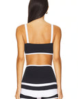 Nubyen Optimist Contrast Bra Top: Premium activewear top featuring a supportive fit, striking contrast design, and breathable fabric. Perfect for workouts, yoga, or athleisure, blending comfort and style to empower your active lifestyle.