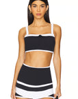 Nubyen Optimist Contrast Bra Top: Premium activewear top featuring a supportive fit, striking contrast design, and breathable fabric. Perfect for workouts, yoga, or athleisure, blending comfort and style to empower your active lifestyle.