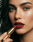 Nubyén Lip Prosperity Plumping Matte Lipstick – A luxurious matte lipstick that plumps, hydrates, and enhances lip volume naturally. Infused with nourishing ingredients like hyaluronic acid and cinnamon, it delivers bold, long-lasting color while keeping lips smooth and moisturized. 100% vegan, cruelty-free, and free from parabens and sulfates, this lipstick is perfect for fuller, healthier-looking lips. Created by medical professionals, it combines beauty and science for confident, radiant results