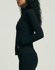 Nubyen Higher Dominion Capsule Sculpt Jacket women’s sculpting activewear jacket with contour fit, waist-cinching design, and premium technical performance fabric.
