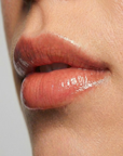 Enhance lip volume with Nubyén Lip Prosperity Tinted Plumping Balm – plant-based lip plumper with cinnamon, Reishi mushroom, lemongrass, and AHAs. Vegan, cruelty-free, recyclable, and free from parabens and sulfates. Instantly hydrates, boosts natural color, and adds a subtle tint for fuller, kissable lips
