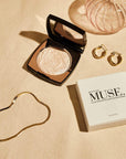 Nubyen Muse Highlighting Powder – vegan, cruelty-free highlighter with handcrafted light-reflecting pearl pigments for a radiant glow. Enhances complexion, blurs fine lines, and adds a subtle shimmer