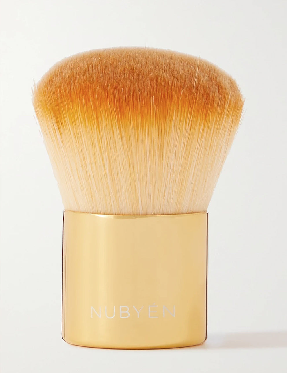 Nubyen Muse Highlighter Face Brush is designed for for flawless highlighter or powder application. This compact, vegan-friendly brush features slanted bristles for precise application on cheekbones, temples, and other sun-kissed areas. Perfect for travel and touch-ups, it delivers a natural glow with ease.