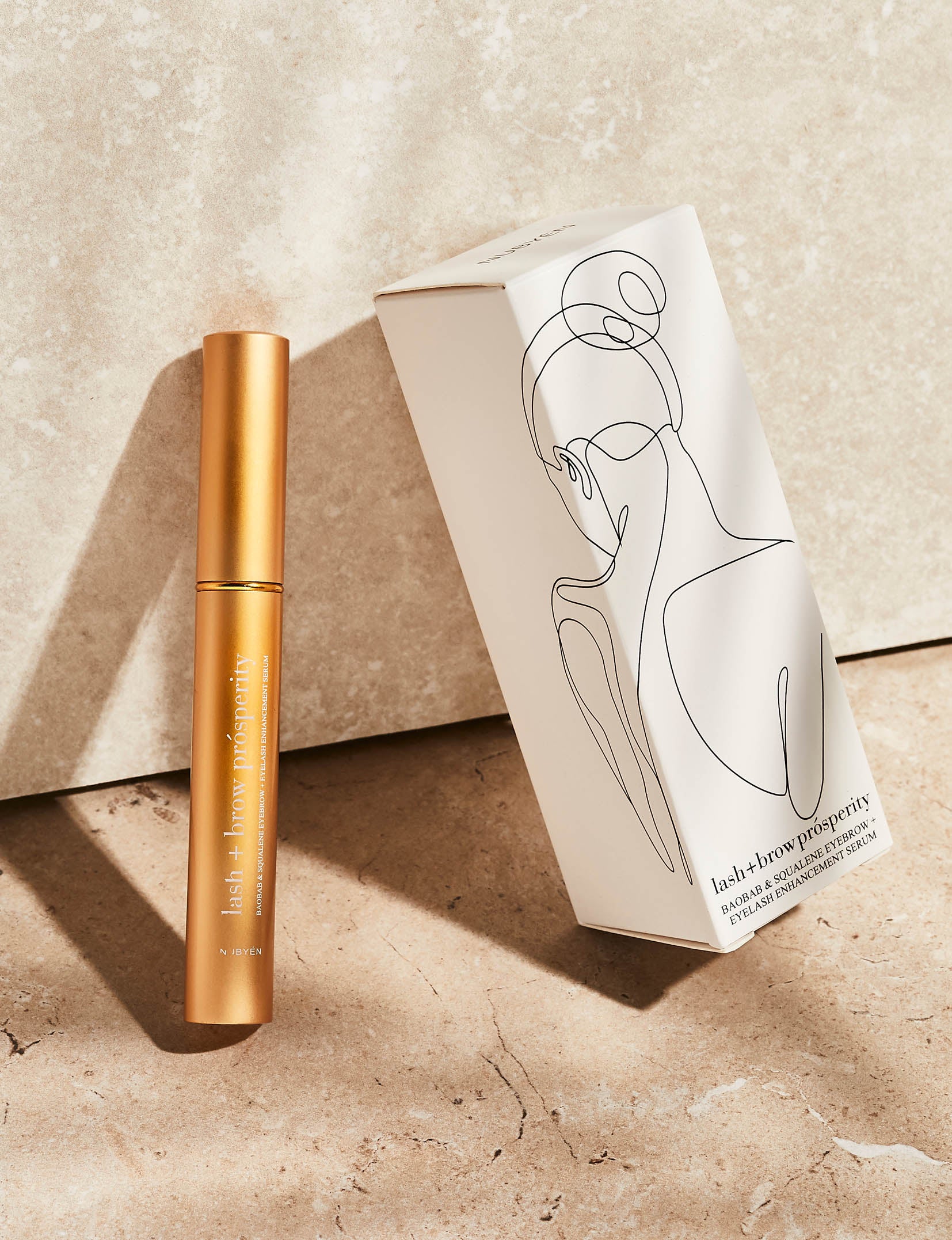 Rejuvenate and strengthen lashes and brows with Nubyén Lash + Brow Prosperity Growth Enhancer. This 100% natural serum combines Baobab, Olive Squalene, Tamanu, and Candlenut oils to repair and nourish hair follicles. Infused with rosemary and raspberry seed extracts, it rebuilds keratin bonds for fuller, thicker brows and lashes. Lightweight, fast-absorbing, and free from harsh chemicals, it's the perfect solution for safe and natural lash and brow enhancement. Pair with Restore Me Brow Pomade for ultimate