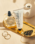 Vitamin C illuminating body cream with Hawaiian orange tree extract, AHA, and magnesium. Brightens, repairs, and nourishes skin with natural skin brighteners like apple, blueberry, and lemon extracts. Non-oily, vegan, and cruelty-free, suitable for all skin types, including acne-prone. Free from silicones, phthalates, parabens, sulfates. Antioxidant-rich for youthful, supple skin.