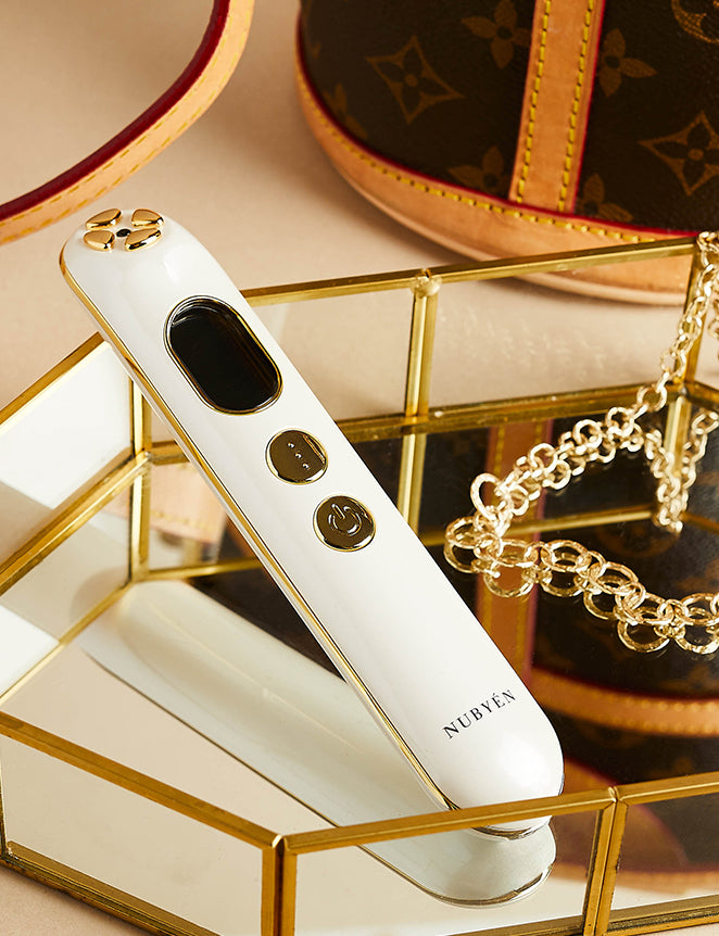 Transform your skincare routine with the Muse Beauty Inheritance 24K Gold Skin-Beautifying Device. Designed to reduce fine lines and wrinkles, this portable tool stimulates collagen and elastin production using nano-current technology. Its 24K gold-plated electrodes improve skin brightness, circulation, and firmness while reducing inflammation and redness. Perfect for at-home or on-the-go use, this advanced skincare device enhances your natural glow, leaving your skin rejuvenated, contoured, and youthful.