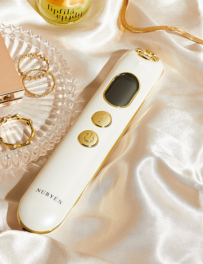Transform your skincare routine with the Muse Beauty Inheritance 24K Gold Skin-Beautifying Device. Designed to reduce fine lines and wrinkles, this portable tool stimulates collagen and elastin production using nano-current technology. Its 24K gold-plated electrodes improve skin brightness, circulation, and firmness while reducing inflammation and redness. Perfect for at-home or on-the-go use, this advanced skincare device enhances your natural glow, leaving your skin rejuvenated, contoured, and youthful.