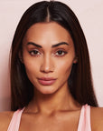 Nubyen Muse Highlighter Face Brush is designed for for flawless highlighter or powder application. This compact, vegan-friendly brush features slanted bristles for precise application on cheekbones, temples, and other sun-kissed areas. Perfect for travel and touch-ups, it delivers a natural glow with ease.
