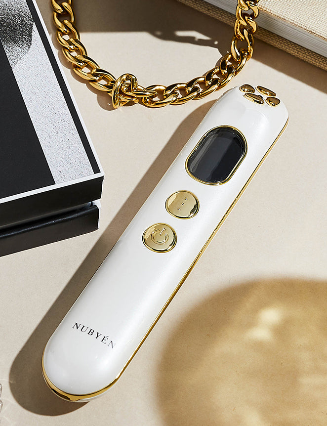 Transform your skincare routine with the Muse Beauty Inheritance 24K Gold Skin-Beautifying Device. Designed to reduce fine lines and wrinkles, this portable tool stimulates collagen and elastin production using nano-current technology. Its 24K gold-plated electrodes improve skin brightness, circulation, and firmness while reducing inflammation and redness. Perfect for at-home or on-the-go use, this advanced skincare device enhances your natural glow, leaving your skin rejuvenated, contoured, and youthful.