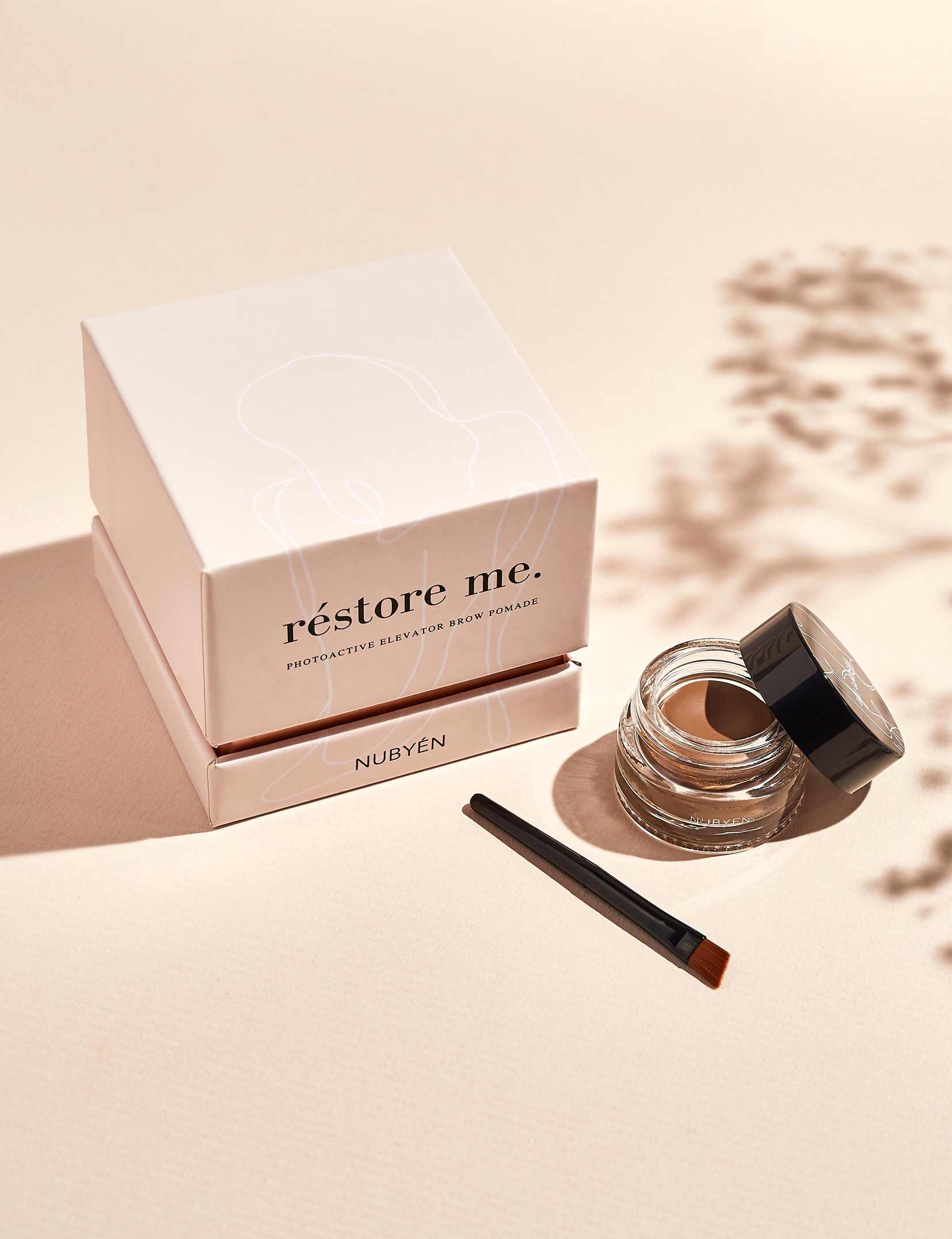 Nubyén Restore Me Photoactive Elevator Brow Pomade delivers perfectly sculpted, fuller-looking brows with a natural finish. Infused with photoactive technology, this lightweight, long-lasting pomade enhances brow shape and definition while nourishing with plant-based ingredients. Vegan, cruelty-free, and smudge-resistant for all-day wear. Achieve flawless brows effortlessly with this eco-friendly, skin-loving formula.