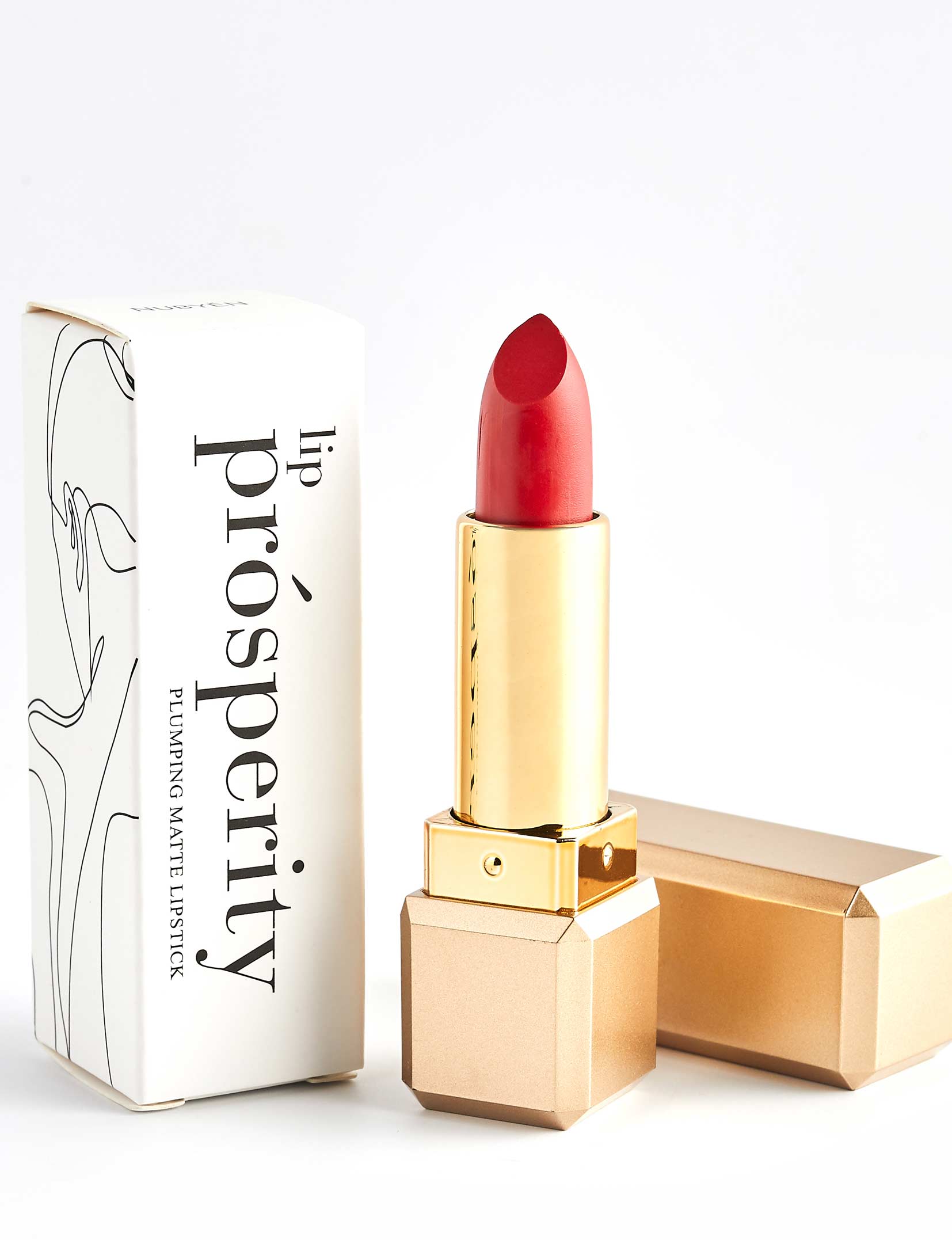 Nubyén Lip Prosperity Plumping Matte Lipstick – A luxurious matte lipstick that plumps, hydrates, and enhances lip volume naturally. Infused with nourishing ingredients like hyaluronic acid and cinnamon, it delivers bold, long-lasting color while keeping lips smooth and moisturized. 100% vegan, cruelty-free, and free from parabens and sulfates, this lipstick is perfect for fuller, healthier-looking lips. Created by medical professionals, it combines beauty and science for confident, radiant results