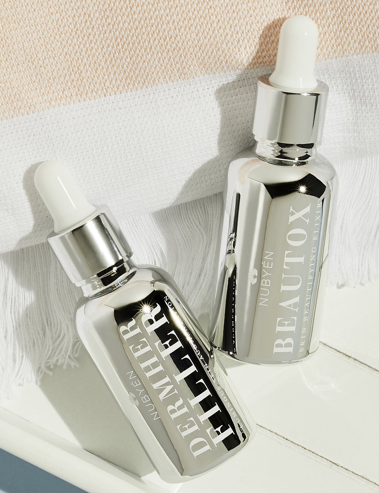 Nubyén Dermher Filler Skin Serum – Vegan alternative to injectable fillers with natural ingredients like Hyaluronic Acid, Reishi, and Melon to lift and brighten skin for a youthful glow.