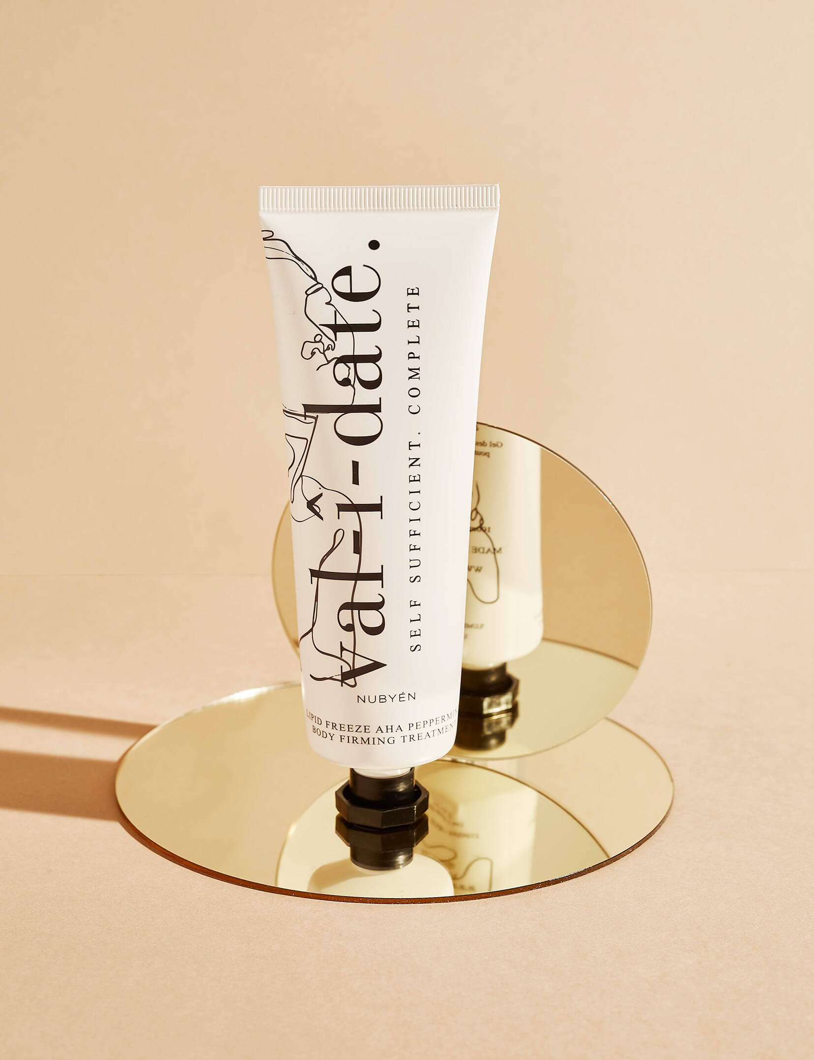Nubyén Lipid Freeze AHA Firming Body Treatment with Peppermint, 100ml | Skin firming and contouring cream with peppermint, AHA, and Manuka honey for a lifted, youthful appearance.