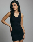 Marylebone Low Back Flare Dress featuring a stunning low-back design and a flattering flared silhouette. Crafted with high-quality, lightweight fabric, this dress combines sophistication and comfort, perfect for formal events or evening occasions. Its timeless design highlights effortless style and grace