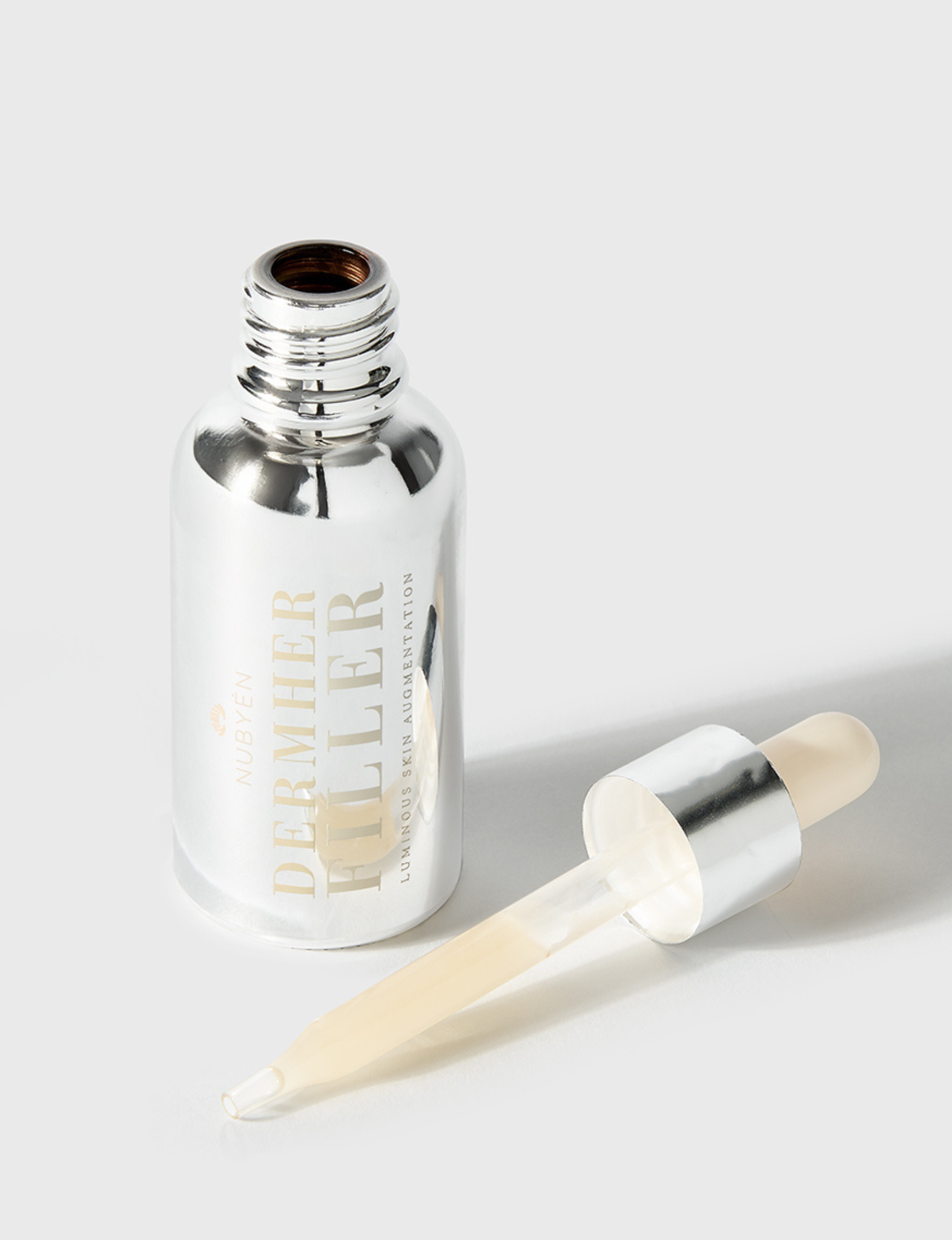 Nubyén Dermher Filler Skin Serum – Vegan alternative to injectable fillers with natural ingredients like Hyaluronic Acid, Reishi, and Melon to lift and brighten skin for a youthful glow.