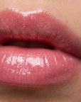 Enhance lip volume with Nubyén Lip Prosperity Tinted Plumping Balm – plant-based lip plumper with cinnamon, Reishi mushroom, lemongrass, and AHAs. Vegan, cruelty-free, recyclable, and free from parabens and sulfates. Instantly hydrates, boosts natural color, and adds a subtle tint for fuller, kissable lips