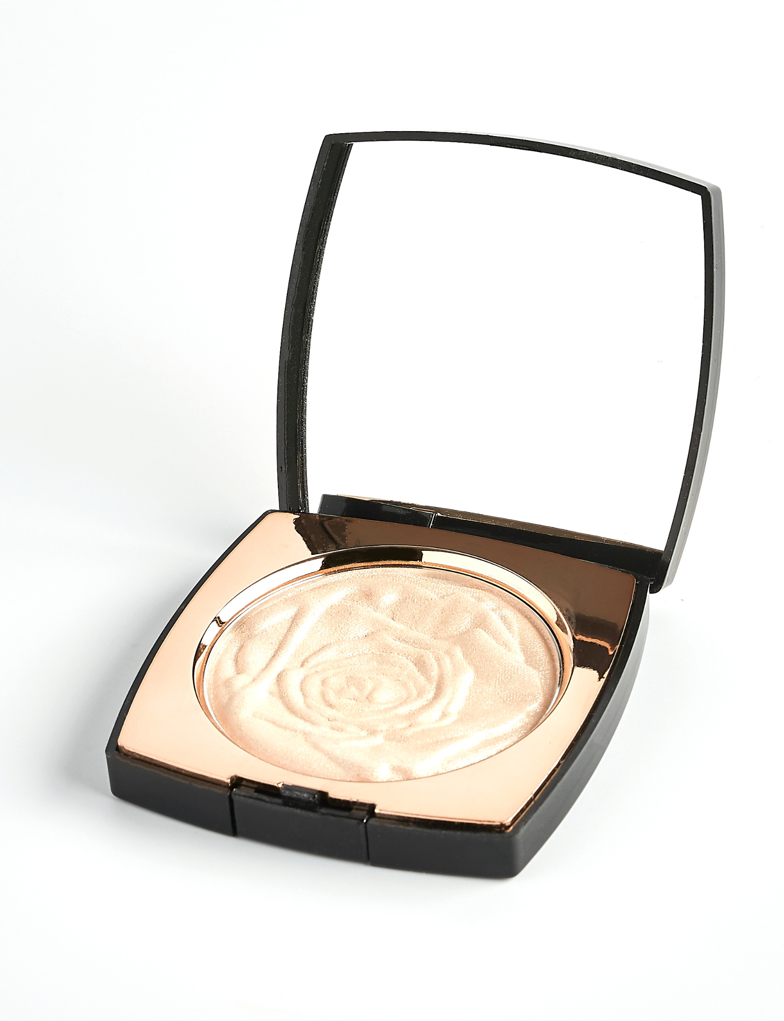 Nubyen best selling  Muse Highlighter shown in its compact, a natural radiant highlighter with papaya fruit extract that brightens the skin and delivers a seamless glow.