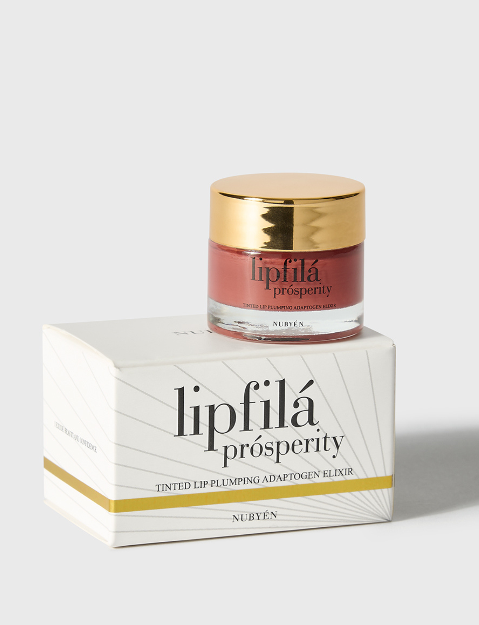 Enhance lip volume with Nubyén Lip Prosperity Tinted Plumping Balm – plant-based lip plumper with cinnamon, Reishi mushroom, lemongrass, and AHAs. Vegan, cruelty-free, recyclable, and free from parabens and sulfates. Instantly hydrates, boosts natural color, and adds a subtle tint for fuller, kissable lips