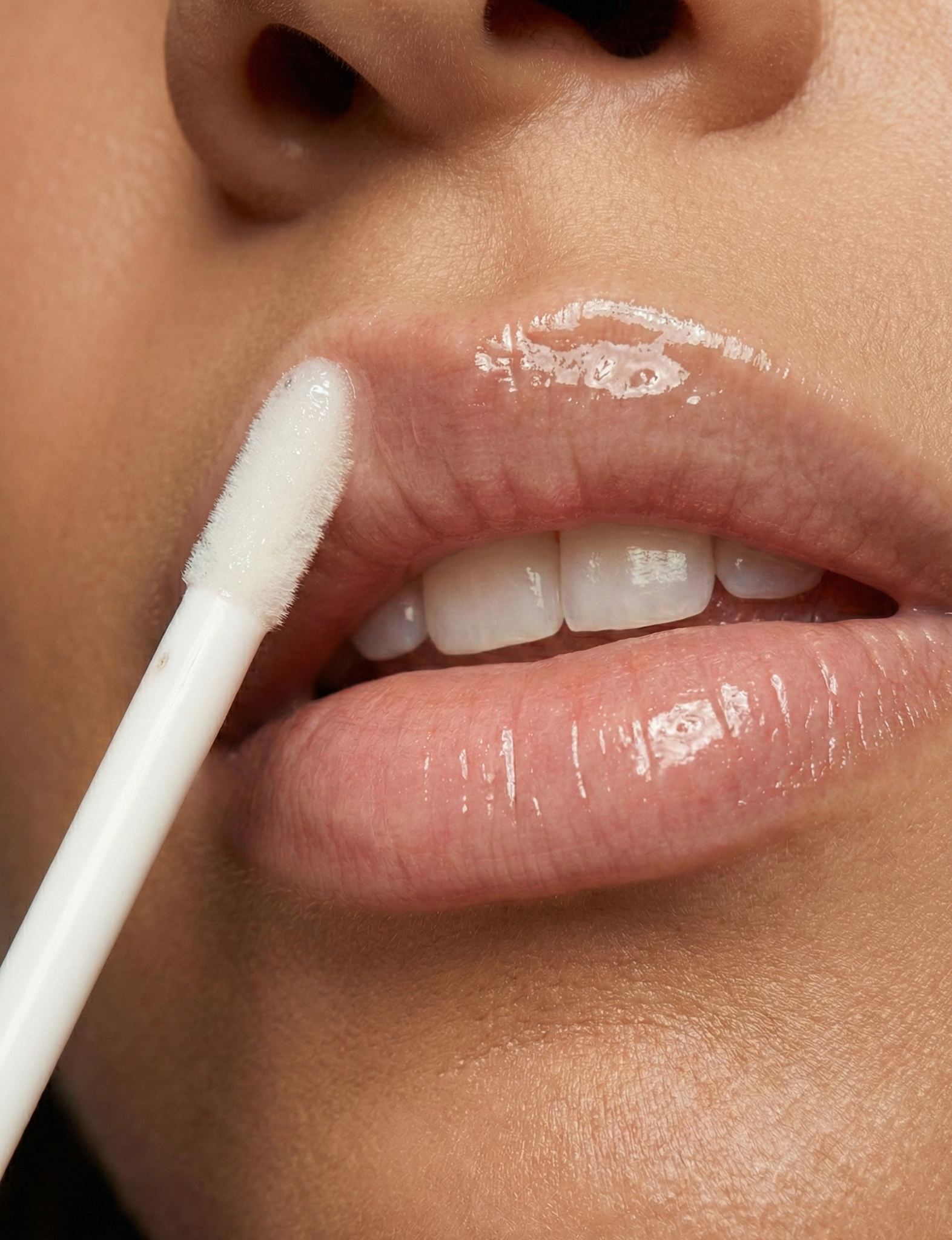 Medical-led nude lip plumper by Nubyen delivering long-lasting hydration, soft shine, and naturally fuller-looking lips