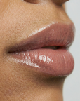 Enhance lip volume with Nubyén Lip Prosperity Tinted Plumping Balm – plant-based lip plumper with cinnamon, Reishi mushroom, lemongrass, and AHAs. Vegan, cruelty-free, recyclable, and free from parabens and sulfates. Instantly hydrates, boosts natural color, and adds a subtle tint for fuller, kissable lips