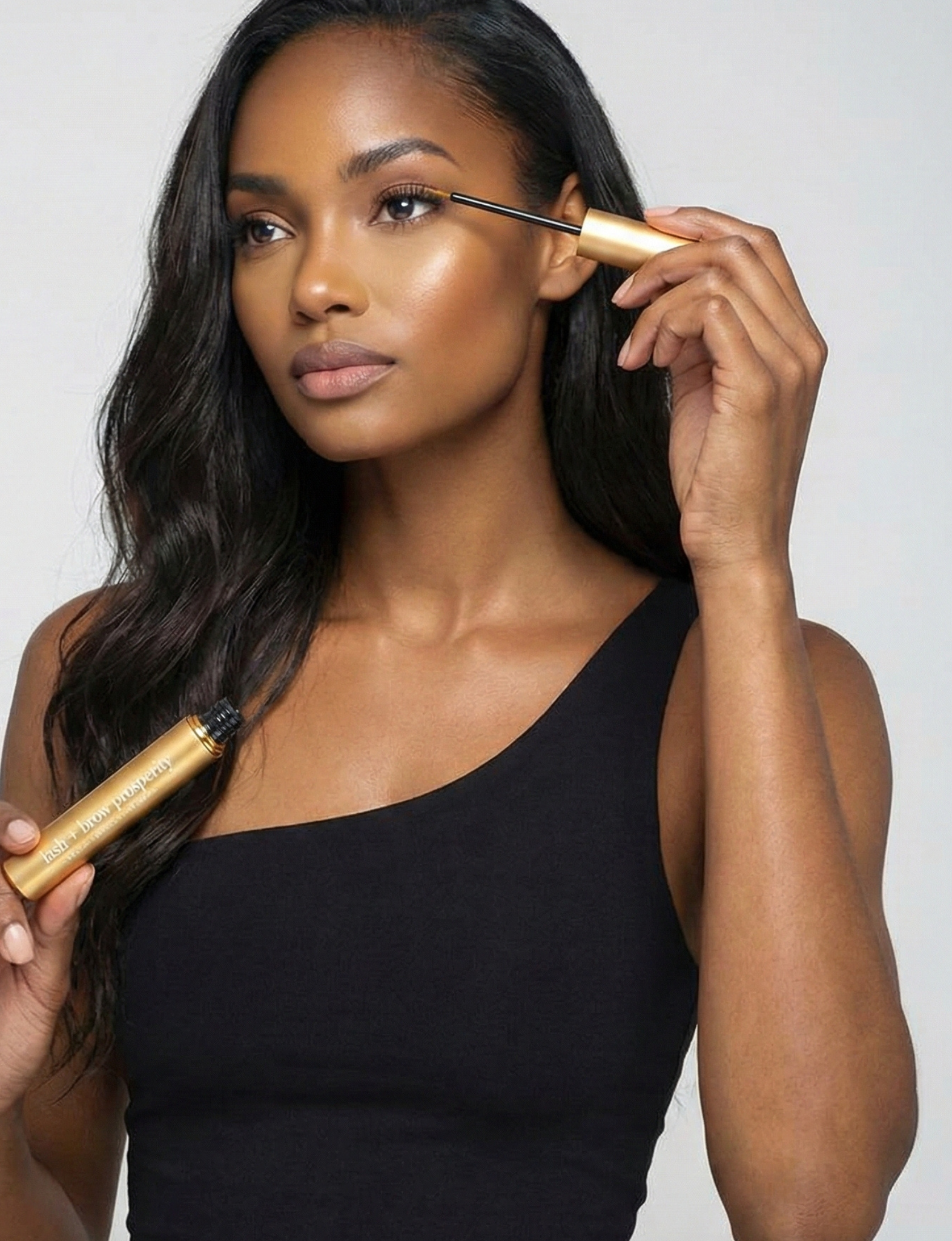 Rejuvenate and strengthen lashes and brows with Nubyén Lash + Brow Prosperity Growth Enhancer. This 100% natural serum combines Baobab, Olive Squalene, Tamanu, and Candlenut oils to repair and nourish hair follicles. Infused with rosemary and raspberry seed extracts, it rebuilds keratin bonds for fuller, thicker brows and lashes. Lightweight, fast-absorbing, and free from harsh chemicals, it's the perfect solution for safe and natural lash and brow enhancement. Pair with Restore Me Brow Pomade for ultimate 