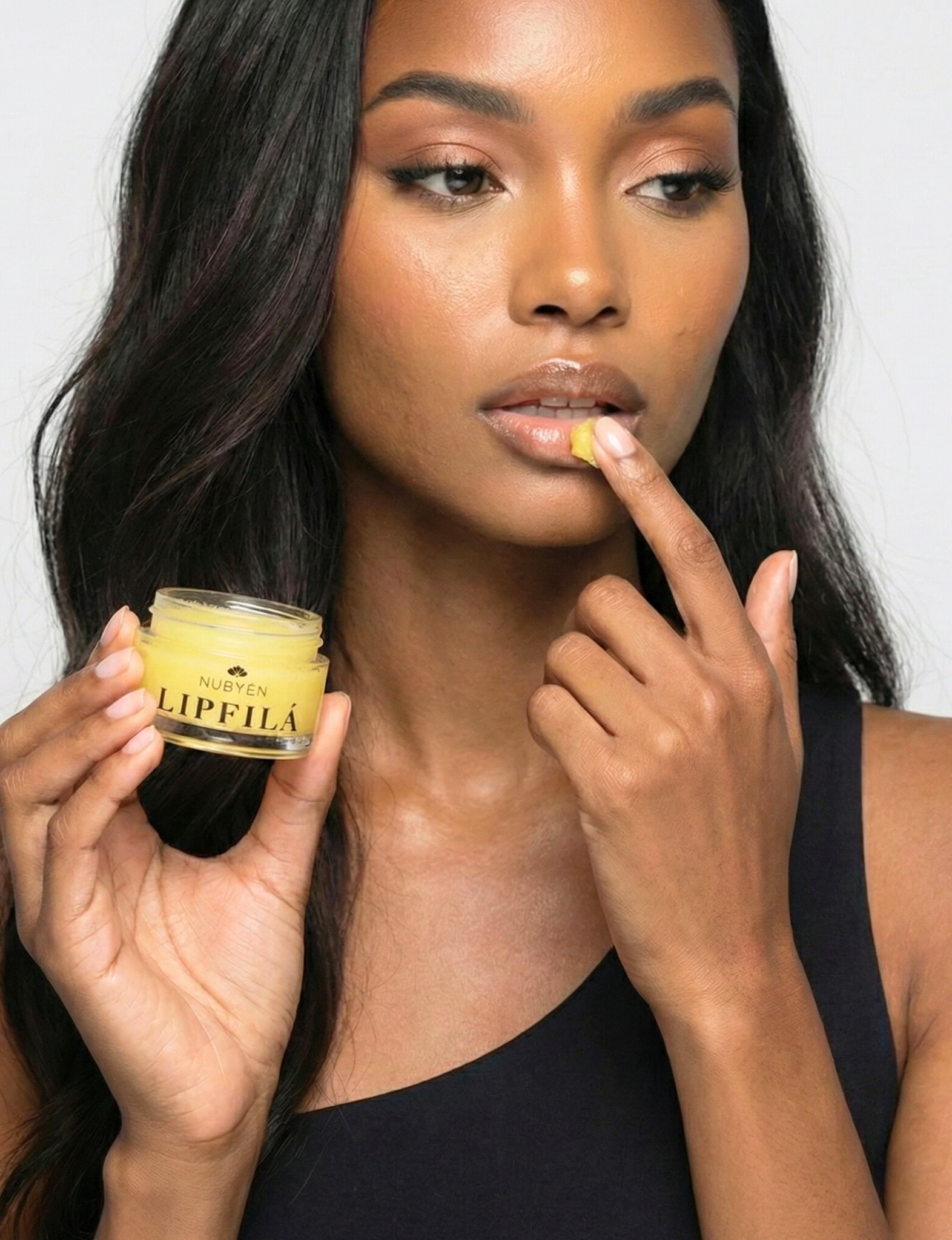 Nubyen lip plumper, best lip plumper, lip plumping gloss, nubyen lip plumping balm, lip plumping balm, This Lip plumping gloss Nubyen Nude, its our best selling vegan and cruelty free gloss for fuller lips instantly, has natural ingredients such as collagen &amp; hyaluronic acid, best lip plumping lipgloss, best lip plumper, lip filler, full lips, lip injections, to faced lip injection, nubyen nude , nubyen lip fila, nubyen lip plumping balm , lip fila, tinted lip plumping elixir, nubyen nude , refy, sephora,