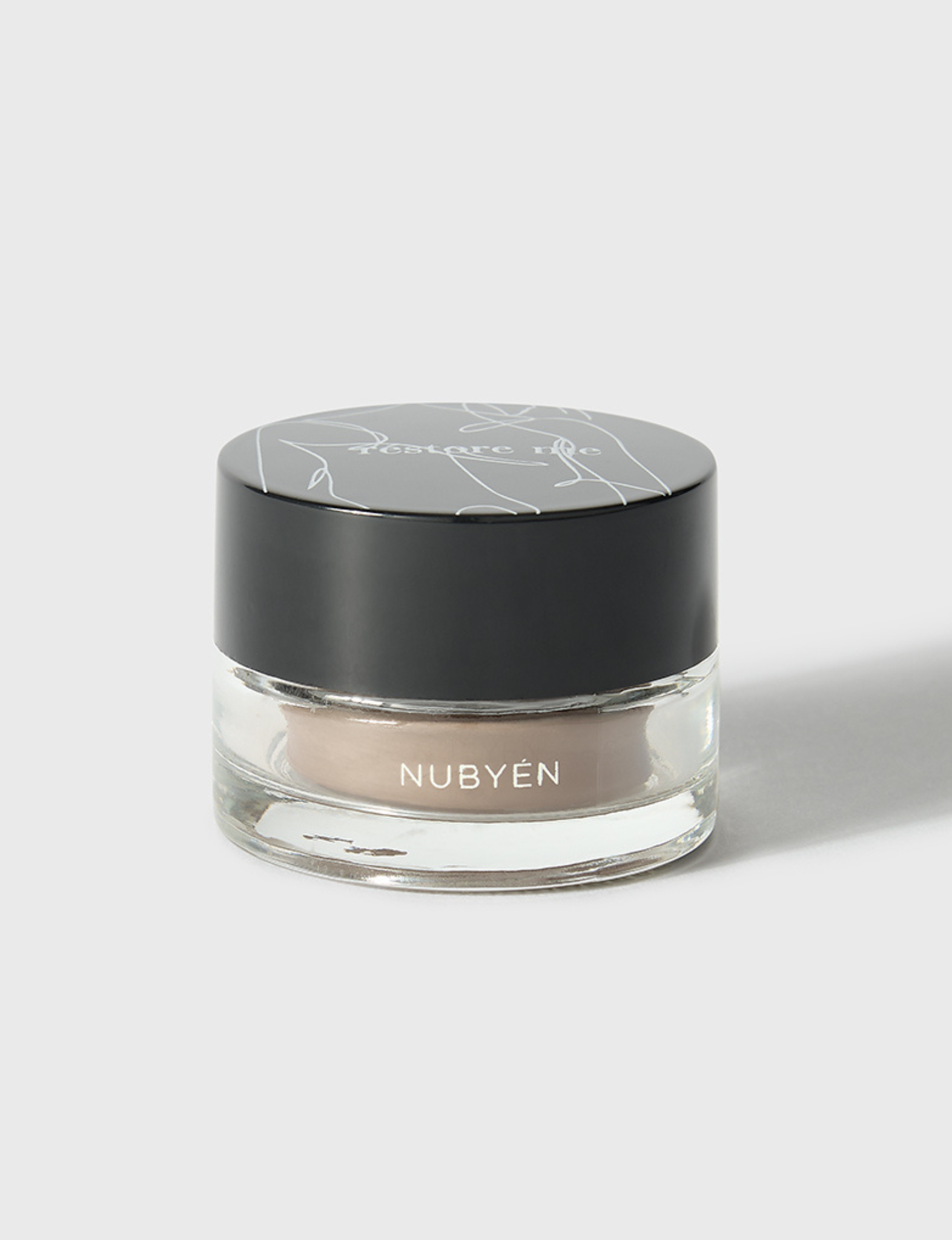 Nubyén Restore Me Photoactive Elevator Brow Pomade delivers perfectly sculpted, fuller-looking brows with a natural finish. Infused with photoactive technology, this lightweight, long-lasting pomade enhances brow shape and definition while nourishing with plant-based ingredients. Vegan, cruelty-free, and smudge-resistant for all-day wear. Achieve flawless brows effortlessly with this eco-friendly, skin-loving formula.