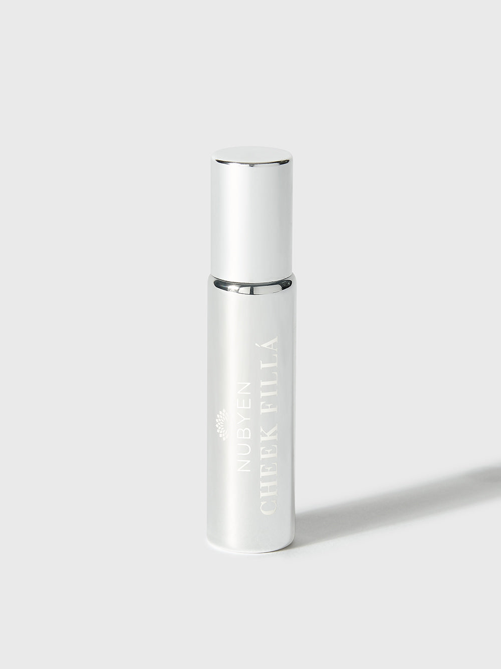 Enhance your cheekbones naturally with Nubyen Cheek Fillá, a clean, vegan cheek-lifting elixir enriched with hyaluronic acid, cinnamon, and AHA fruit extracts for hydration, plumping, and brightening. Perfect for sculpted, radiant cheeks without injections. Eco-friendly glass packaging.