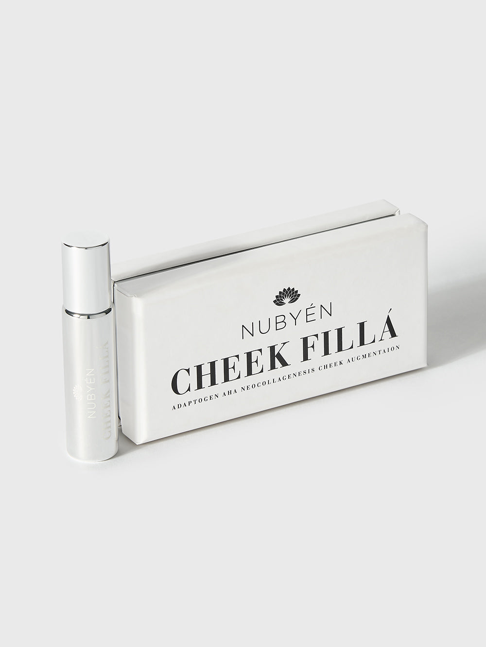 Enhance your cheekbones naturally with Nubyen Cheek Fillá, a clean, vegan cheek-lifting elixir enriched with hyaluronic acid, cinnamon, and AHA fruit extracts for hydration, plumping, and brightening. Perfect for sculpted, radiant cheeks without injections. Eco-friendly glass packaging.