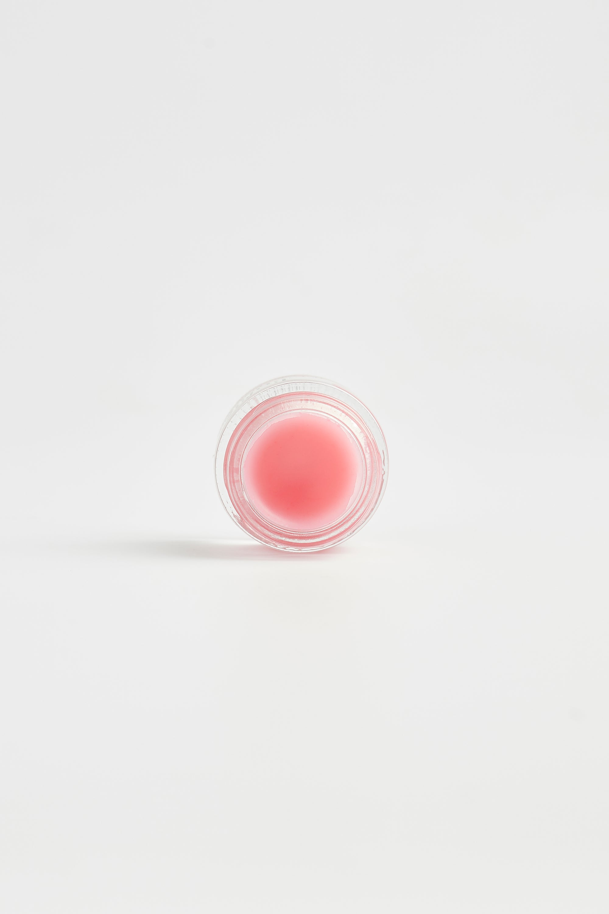 Vegan lip plumping balm by Nubyén for fuller, hydrated lips with plant-based lemongrass and AHAs. Clean, cruelty-free beauty in recyclable glass jars. Safe alternative to lip fillers with pigmented color.