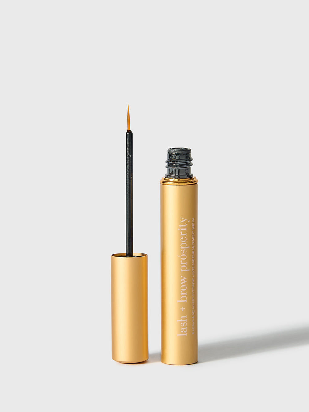 Rejuvenate and strengthen lashes and brows with Nubyén Lash + Brow Prosperity Growth Enhancer. This 100% natural serum combines Baobab, Olive Squalene, Tamanu, and Candlenut oils to repair and nourish hair follicles. Infused with rosemary and raspberry seed extracts, it rebuilds keratin bonds for fuller, thicker brows and lashes. Lightweight, fast-absorbing, and free from harsh chemicals, it's the perfect solution for safe and natural lash and brow enhancement. Pair with Restore Me Brow Pomade for ultimate 