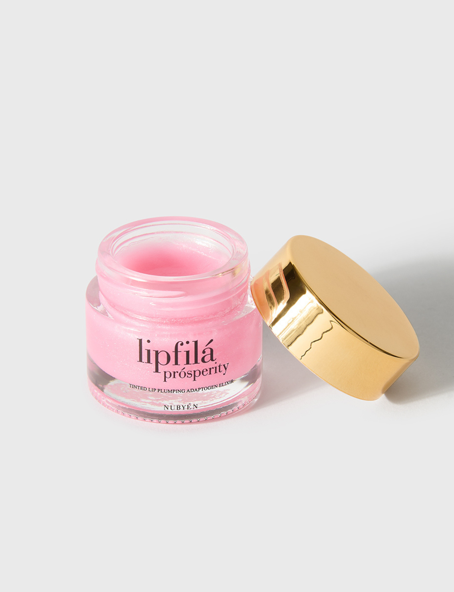 Enhance lip volume with Nubyén Lip Prosperity Tinted Plumping Balm – plant-based lip plumper with cinnamon, Reishi mushroom, lemongrass, and AHAs. Vegan, cruelty-free, recyclable, and free from parabens and sulfates. Instantly hydrates, boosts natural color, and adds a subtle tint for fuller, kissable lips