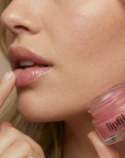 Enhance lip volume with Nubyén Lip Prosperity Tinted Plumping Balm – plant-based lip plumper with cinnamon, Reishi mushroom, lemongrass, and AHAs. Vegan, cruelty-free, recyclable, and free from parabens and sulfates. Instantly hydrates, boosts natural color, and adds a subtle tint for fuller, kissable lips