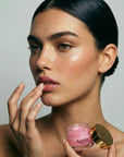 Enhance lip volume with Nubyén Lip Prosperity Tinted Plumping Balm – plant-based lip plumper with cinnamon, Reishi mushroom, lemongrass, and AHAs. Vegan, cruelty-free, recyclable, and free from parabens and sulfates. Instantly hydrates, boosts natural color, and adds a subtle tint for fuller, kissable lips