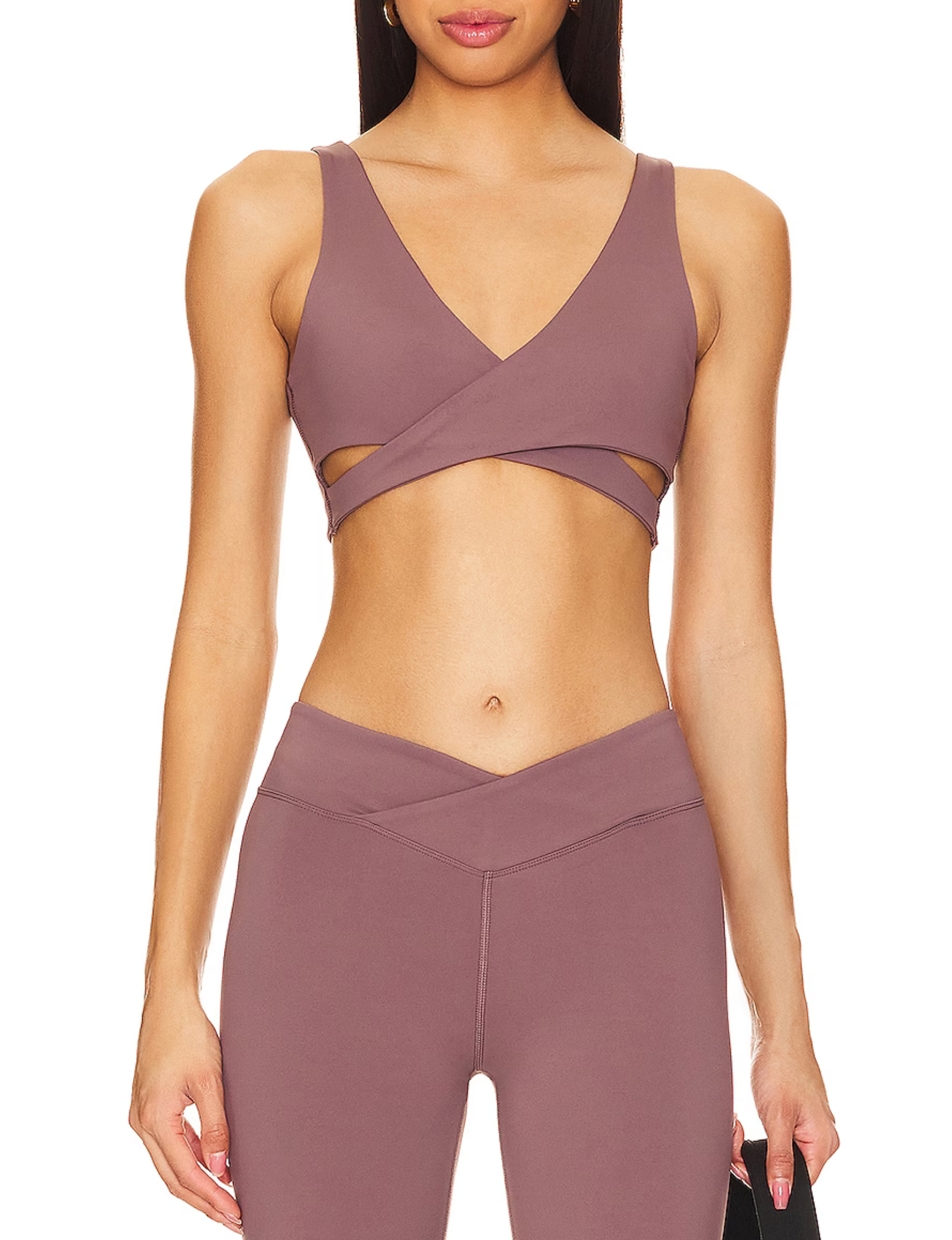 Shop the Nubyen Lleida V Neck Wrap Sports Bra, designed for style, comfort, and performance. Featuring a flattering wrap design and V-neckline, this sports bra provides medium support for yoga, pilates, and gym workouts. Made with breathable, moisture-wicking fabric, it's perfect for active lifestyles. Elevate your fitness wardrobe with this versatile and elegant activewear piece. Vegan and sustainably crafted