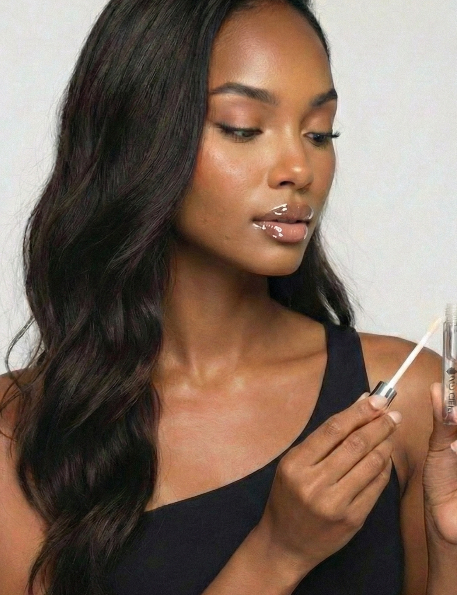 Medical-led nude lip plumper by Nubyen delivering long-lasting hydration, soft shine, and naturally fuller-looking lips