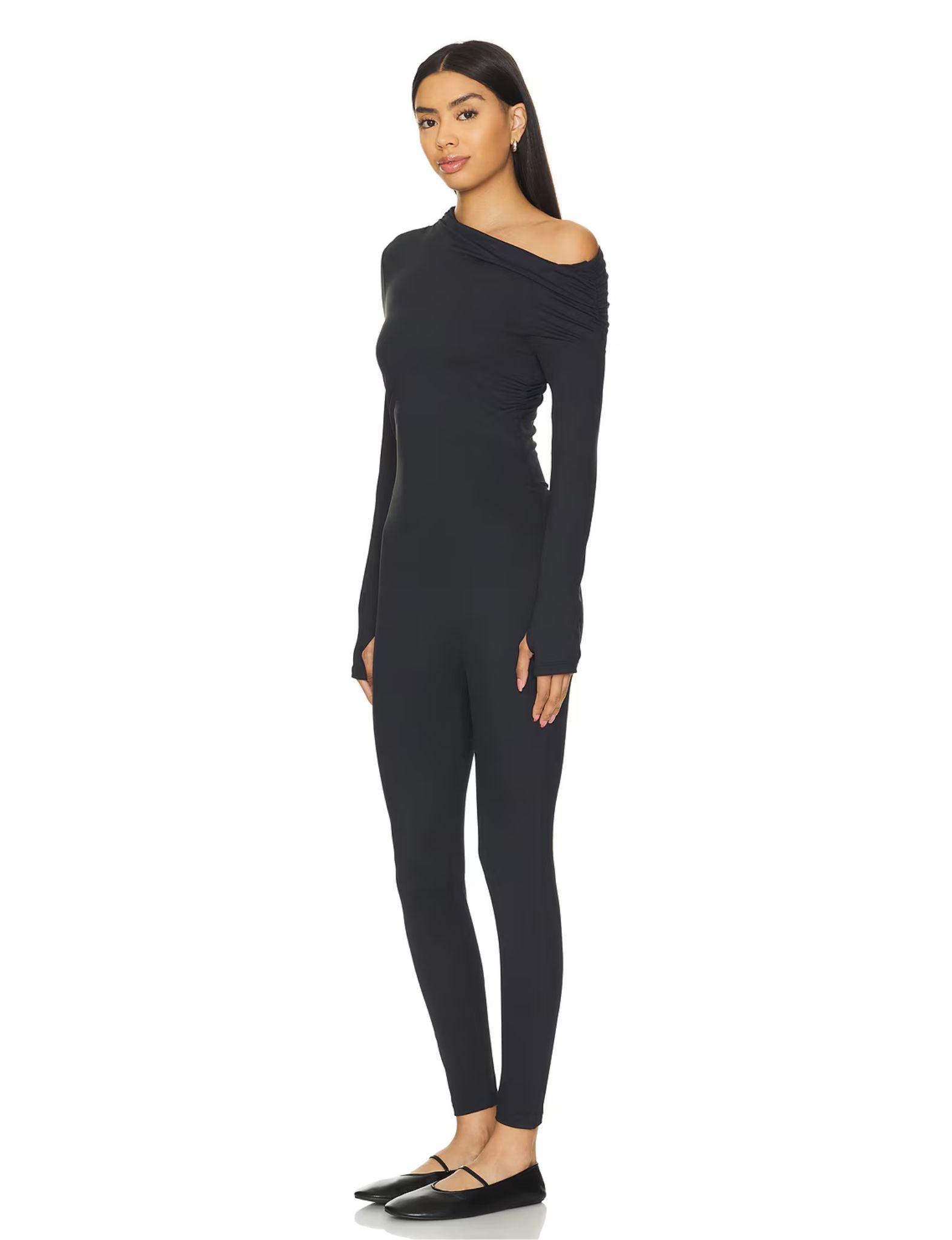 Bold Nubyén Non-conformist Bodysuit featuring a sleek, form-fitting design with unique detailing that exudes confidence and individuality. Made from high-quality, stretchable fabric for comfort and versatility, this statement piece is perfect for layering or wearing alone, embodying a modern, edgy aesthetic