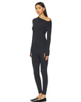 Bold Nubyén Non-conformist Bodysuit featuring a sleek, form-fitting design with unique detailing that exudes confidence and individuality. Made from high-quality, stretchable fabric for comfort and versatility, this statement piece is perfect for layering or wearing alone, embodying a modern, edgy aesthetic