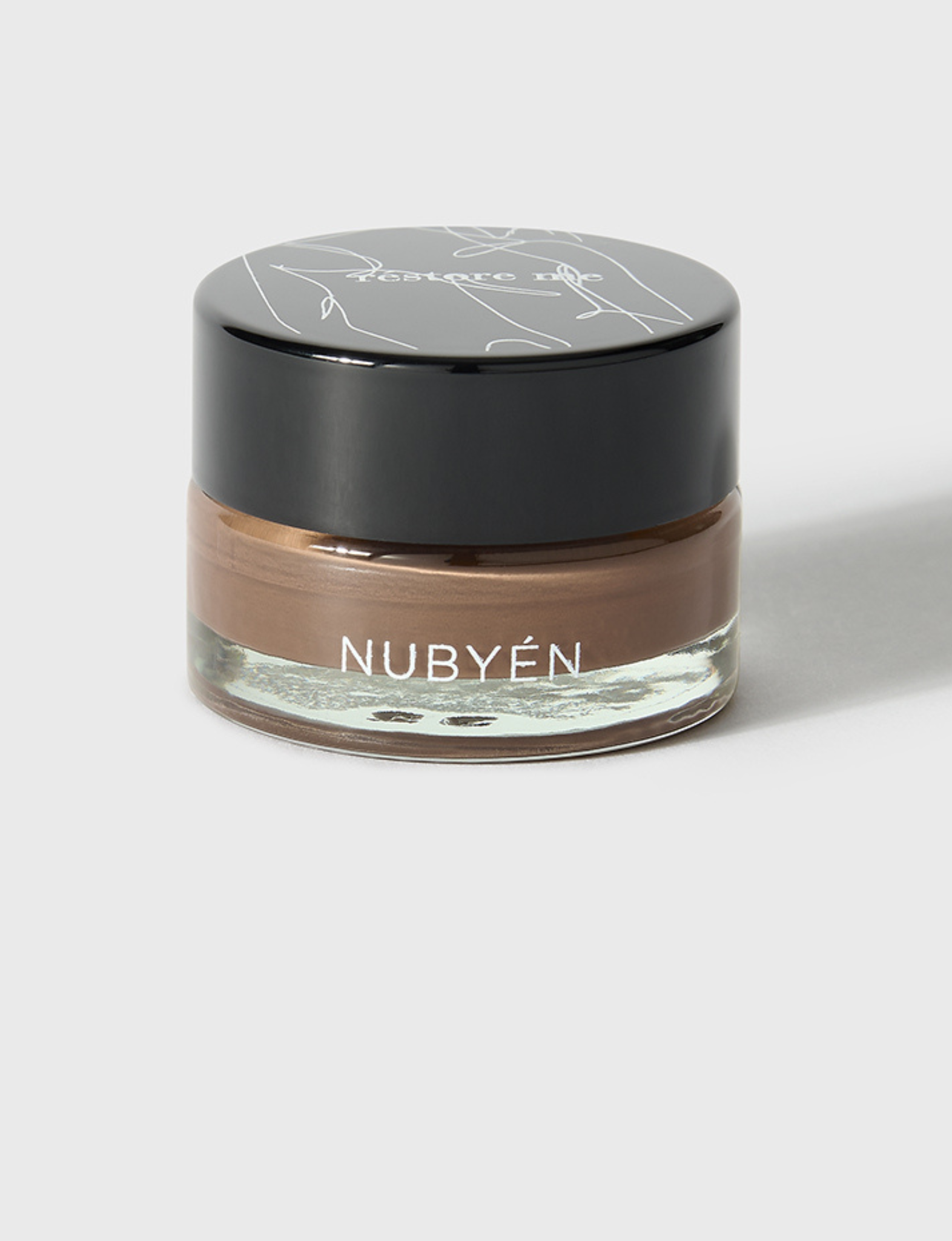 Nubyén Restore Me Photoactive Elevator Brow Pomade delivers perfectly sculpted, fuller-looking brows with a natural finish. Infused with photoactive technology, this lightweight, long-lasting pomade enhances brow shape and definition while nourishing with plant-based ingredients. Vegan, cruelty-free, and smudge-resistant for all-day wear. Achieve flawless brows effortlessly with this eco-friendly, skin-loving formula.