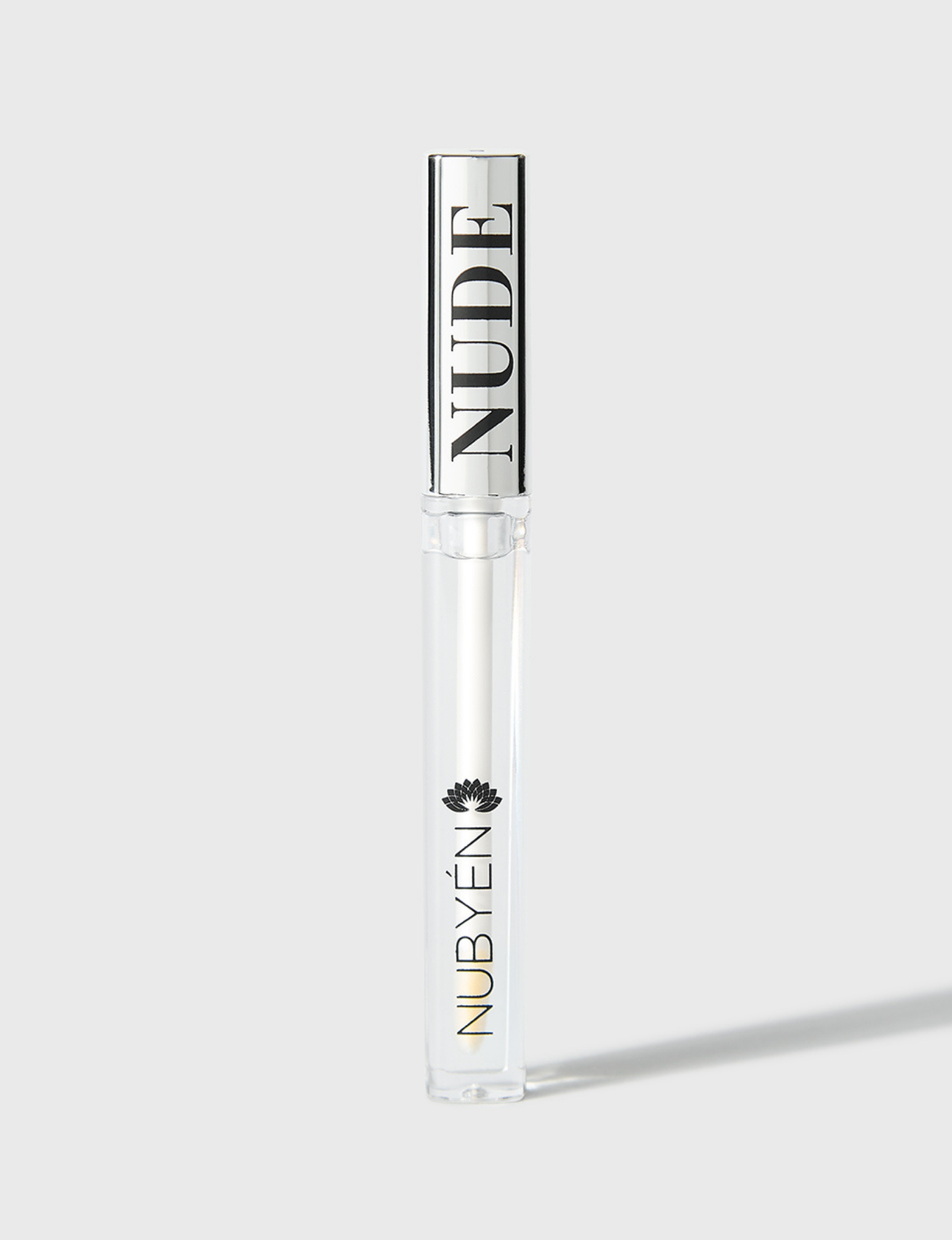 Achieve fuller lips with Nubyén Super Nudes Plumping Lipstick. Vegan, cruelty-free, moisture-matte lipstick infused with peppermint, eucalyptus, lemongrass, and collagen to enhance lip volume naturally. Available in 10 flattering nude shades, perfect for a soft, plump, kissable pout. Safe to use with or without fillers. Clean beauty formula, free of parabens, sulfates, and phthalates.