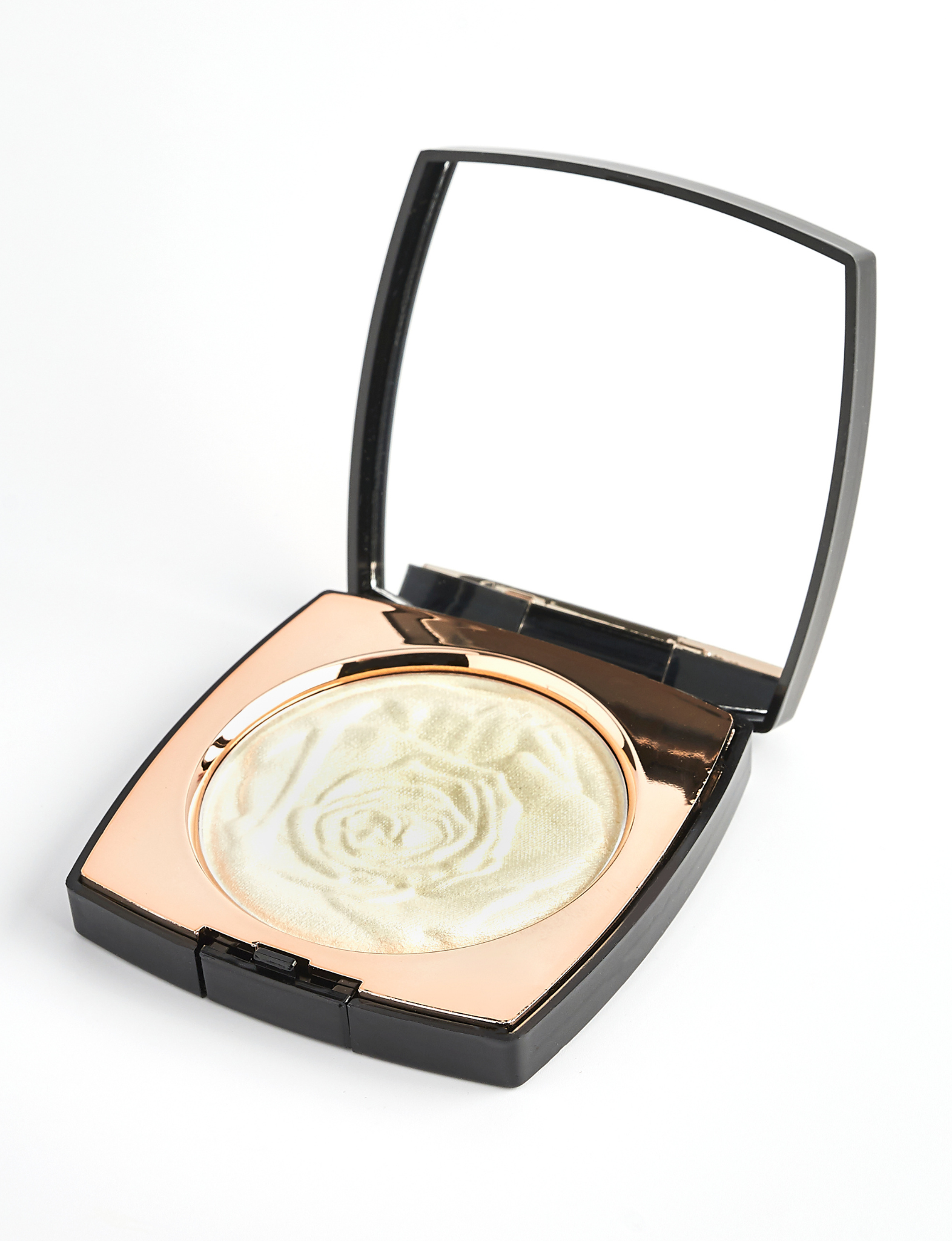 Nubyen best selling  Muse Highlighter shown in its compact, a natural radiant highlighter with papaya fruit extract that brightens the skin and delivers a seamless glow.