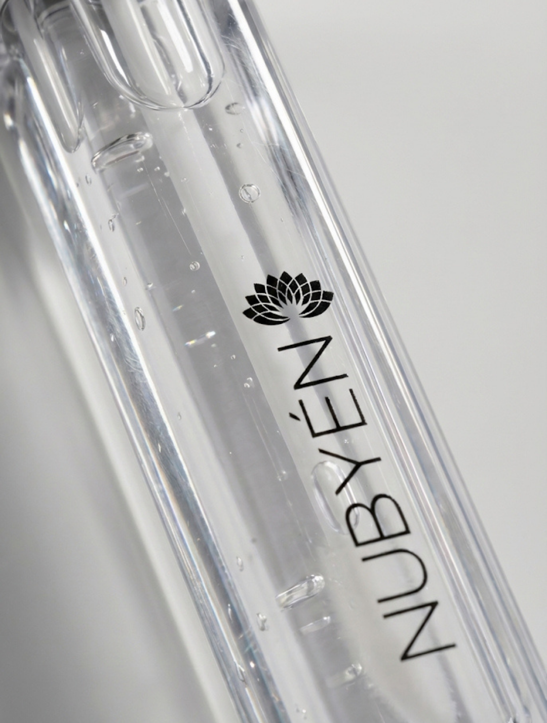 Nubyén Nude Lip Plumping Augmentation Gloss -best safe, reversible lip plumper and a natural alternative to fillers for fuller lips.